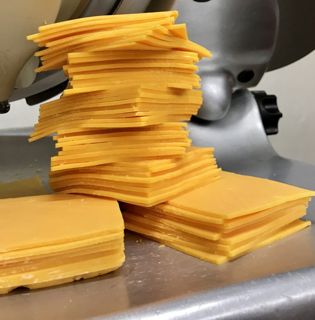 Sliced Cheddar Cheese 4.69 per lb Snider Bros. Meats